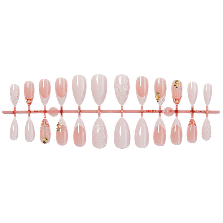Acrylic nail set with elegant and floral decorations Stornfield
