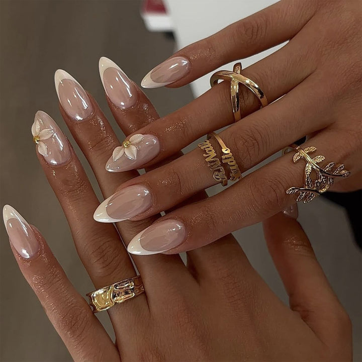 Artful stiletto nails with elegant floral design Stornfield