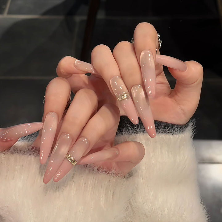 Glamorous artificial nails with elegant glitter and rhinestone application Stornfield