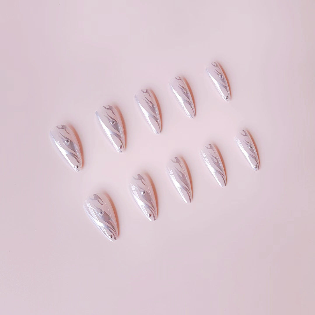 Nail set with elegant water drop design and 3D accents Stornfield