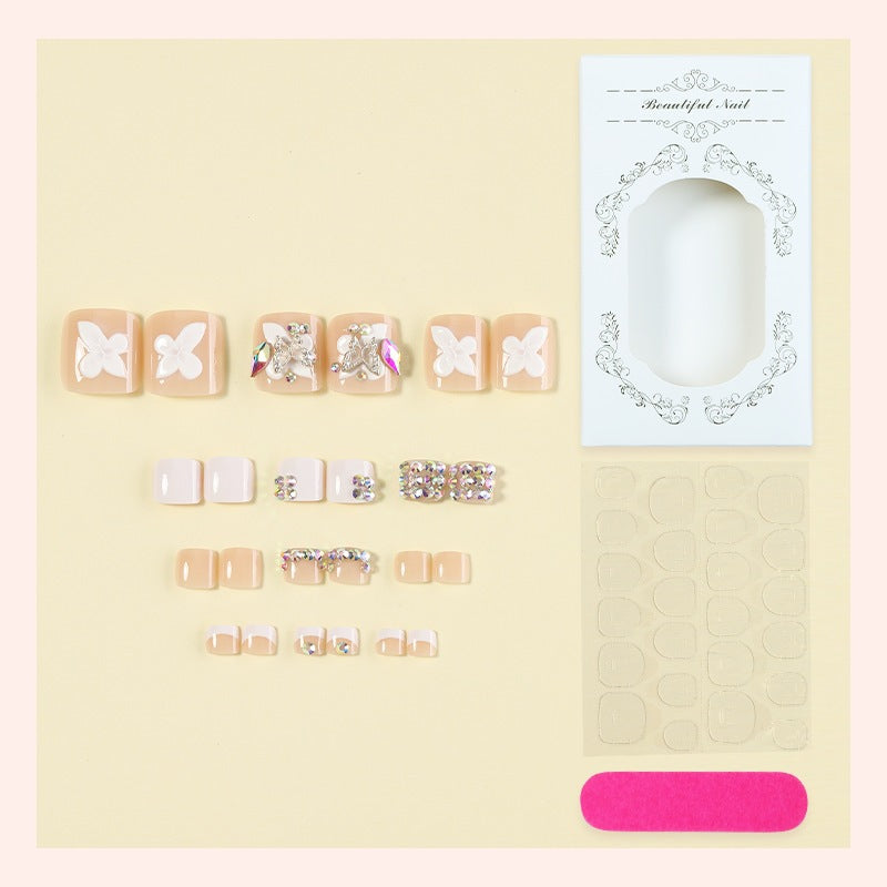 Artificial nail set with elegant butterfly accents Stornfield