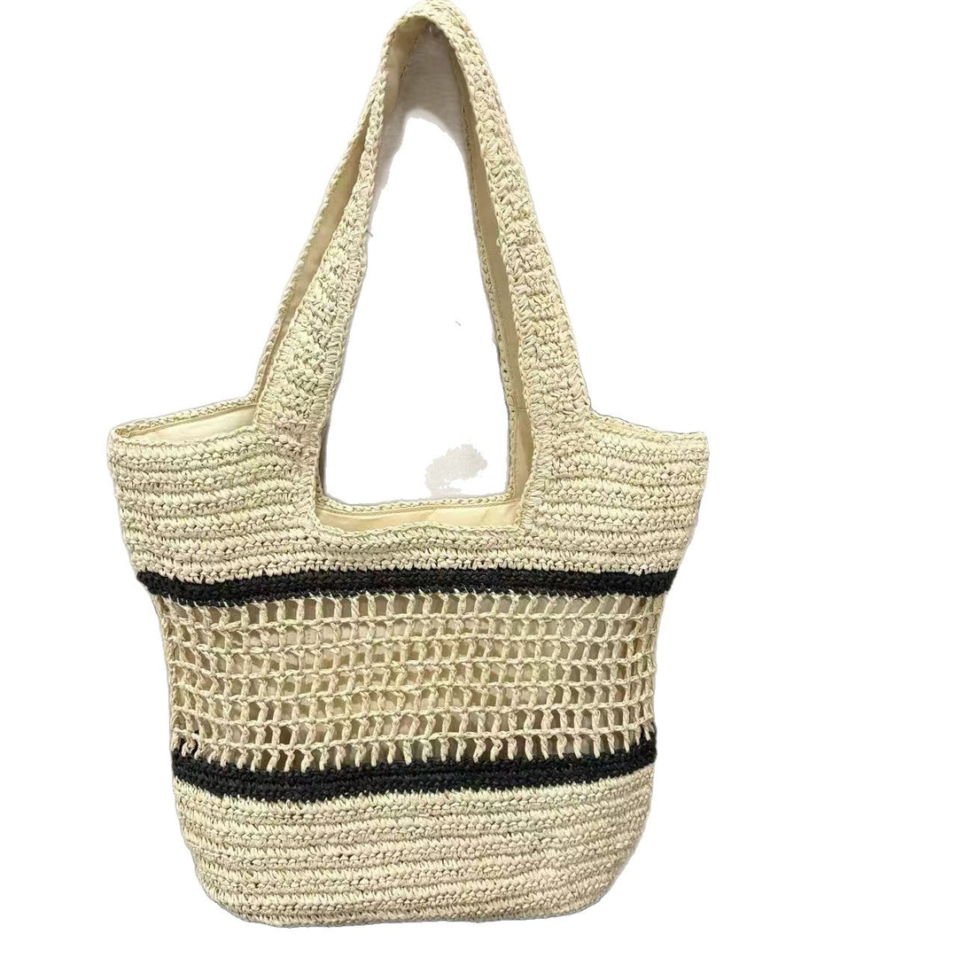 Woven natural material handbag with elegant structure Stornfield