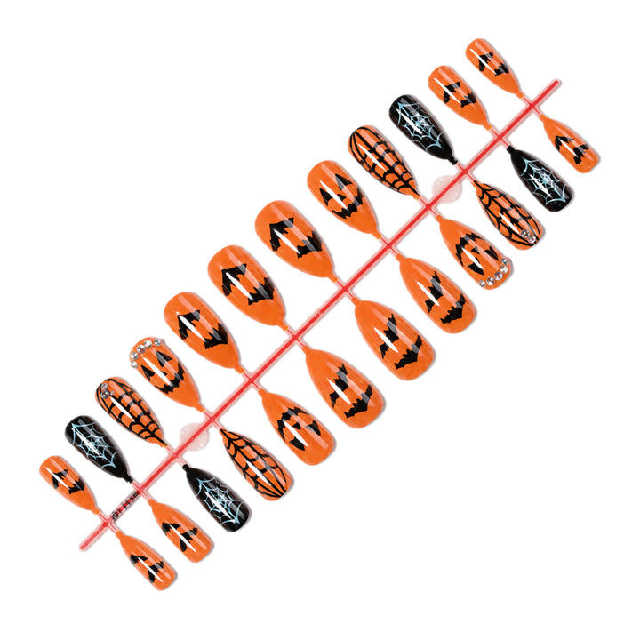 Acrylic nail set with Halloween designs and glitter elements Stornfield