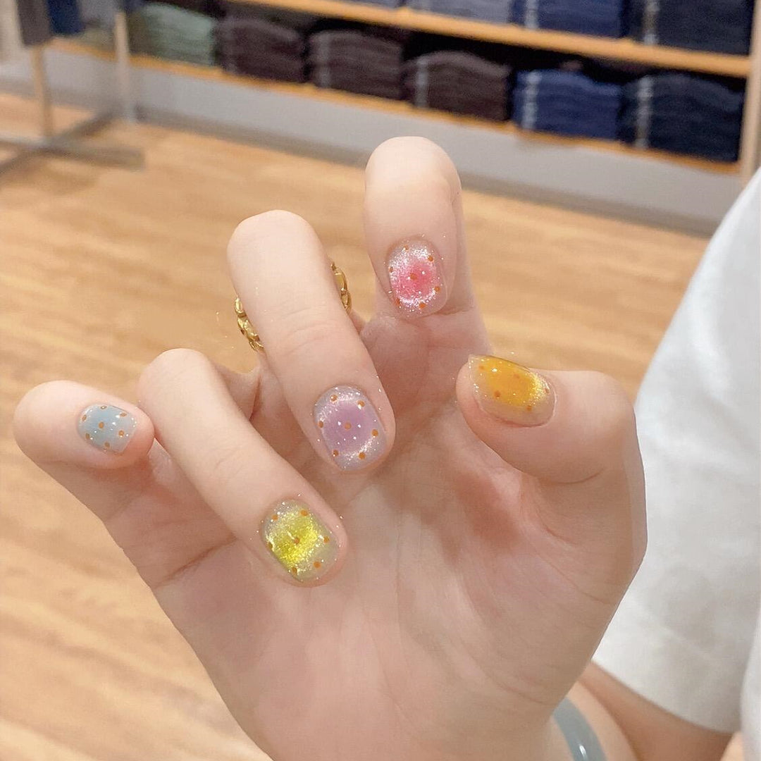 Glittering artificial nail tips in cheerful design Stornfield