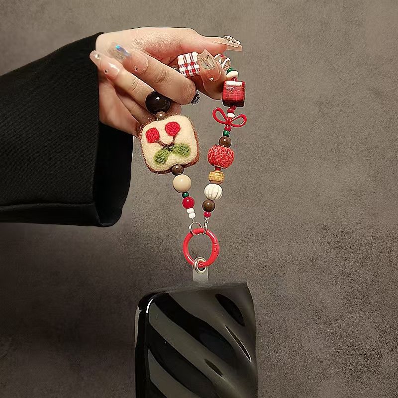 Playful Themed Beaded Keychain Stornfield