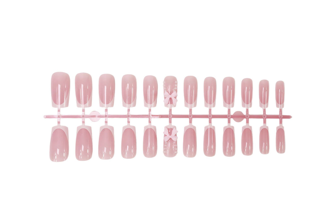 Acrylic nail set with trendy 3D decorations and elegant accents Stornfield
