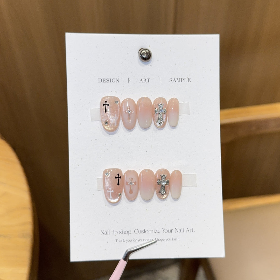 Artificial nail tips with cross design Stornfield
