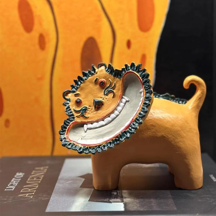 Playful Ceramic Lion Figurine