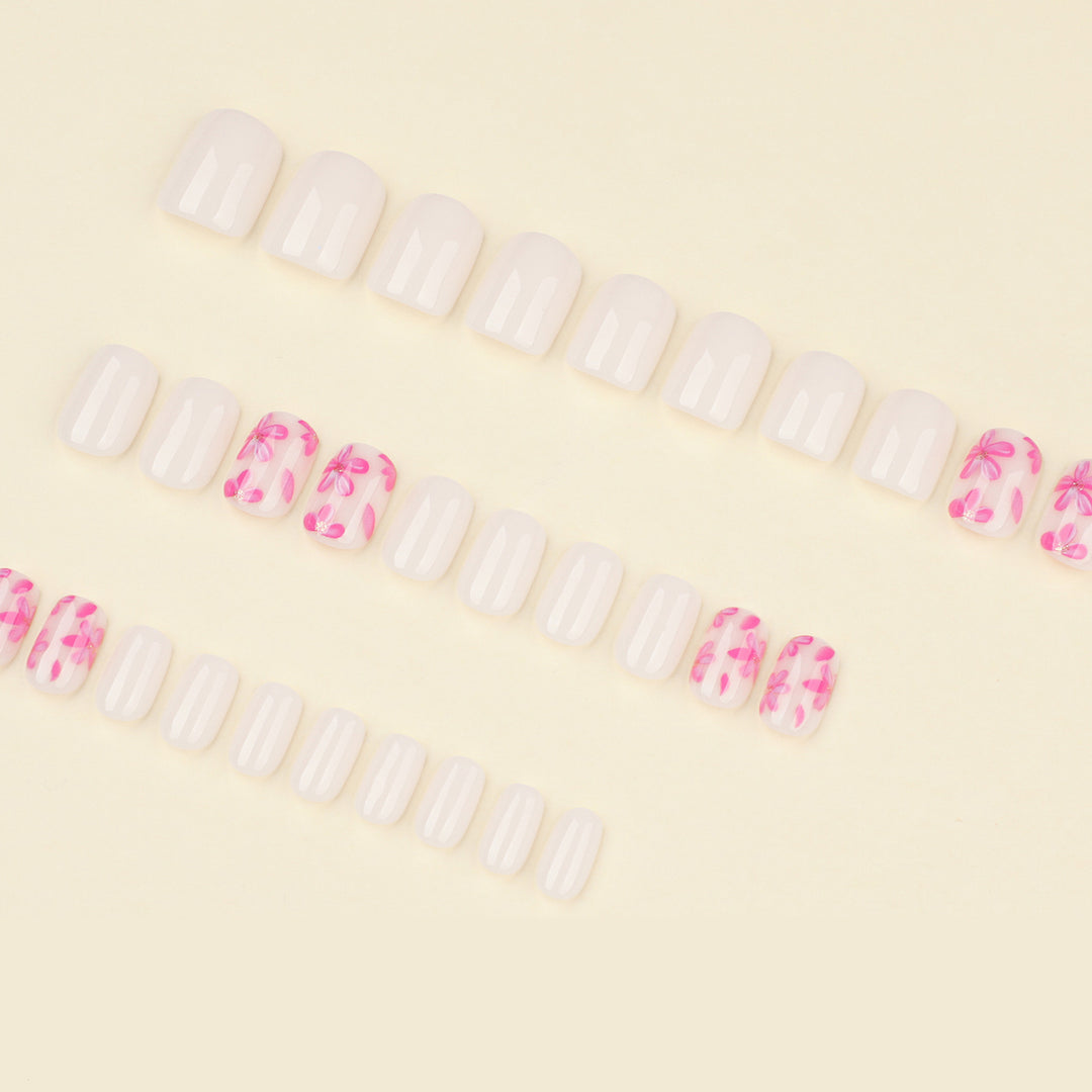 Stylish artificial nail design with floral accents Stornfield