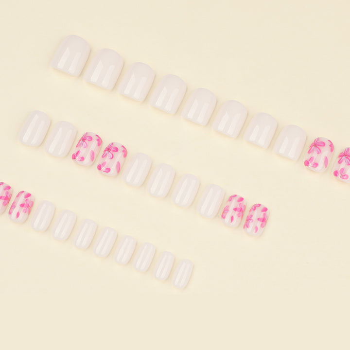 Stylish artificial nail design with floral accents Stornfield