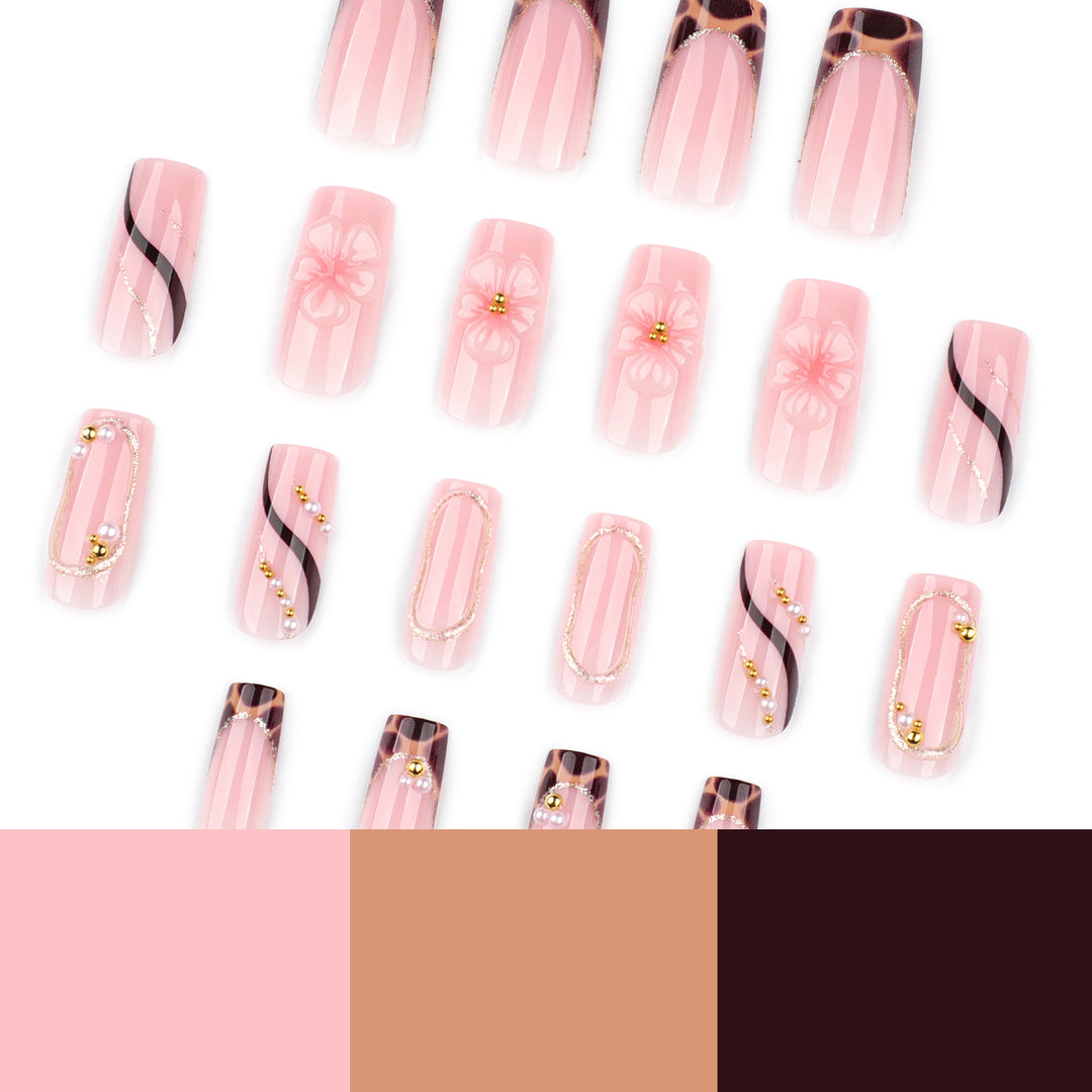 Artificial nail art with flower and glitter effects Stornfield