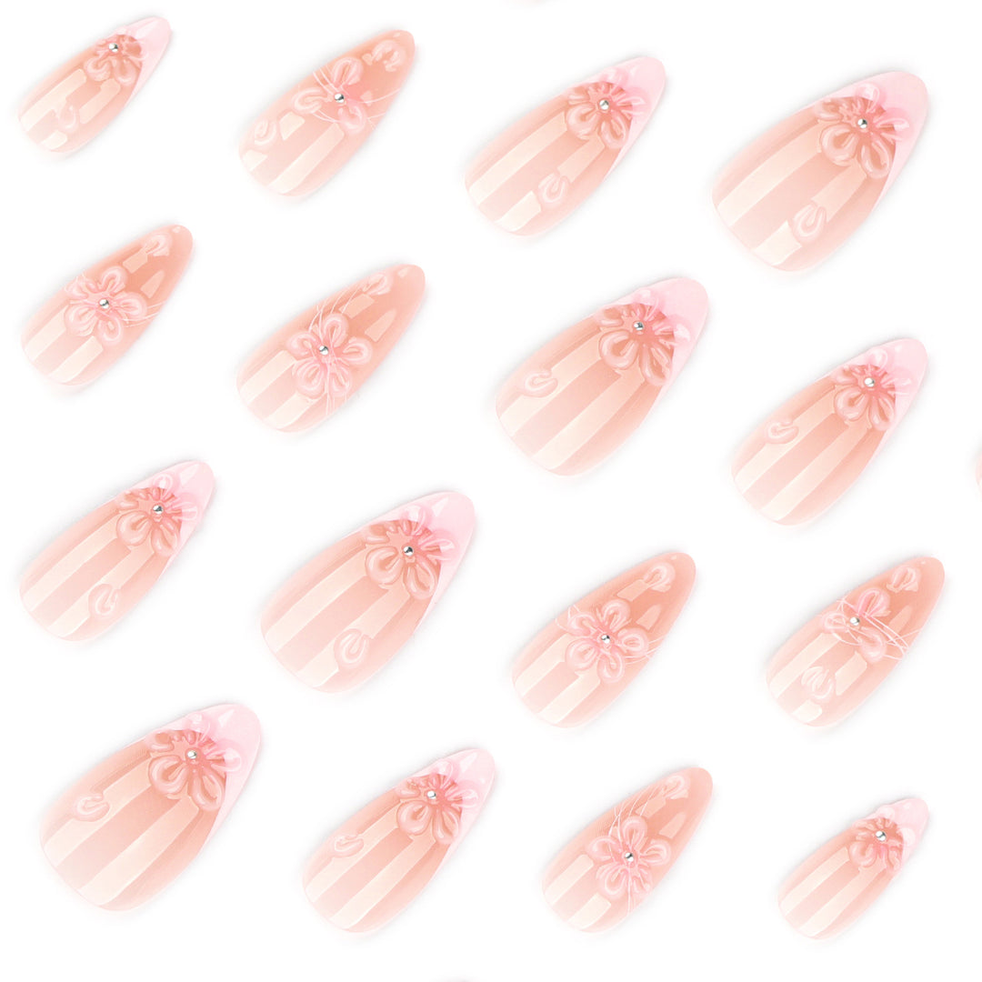 Artful nail extensions with floral 3D details Stornfield