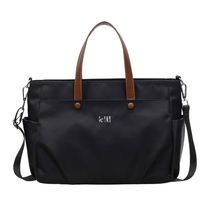 Shopping bag with comfortable carrying system and practical outer pockets Stornfield