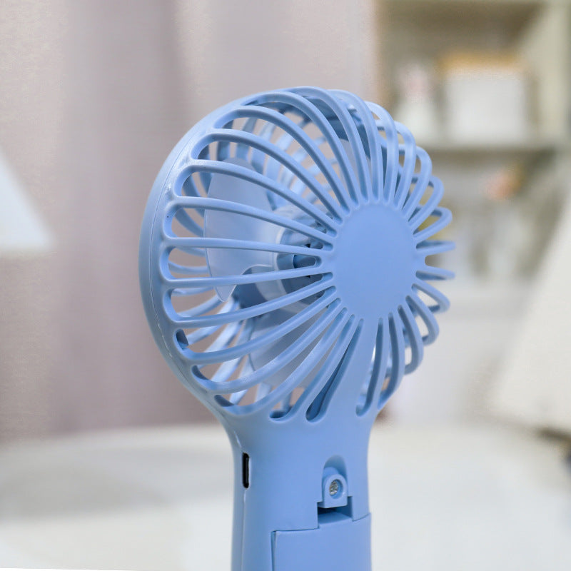 Ladies portable hand fan with ergonomic design and USB charging function Stornfield