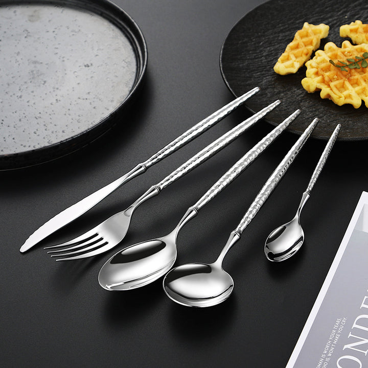 Elegant soup spoon with structured handle Stornfield