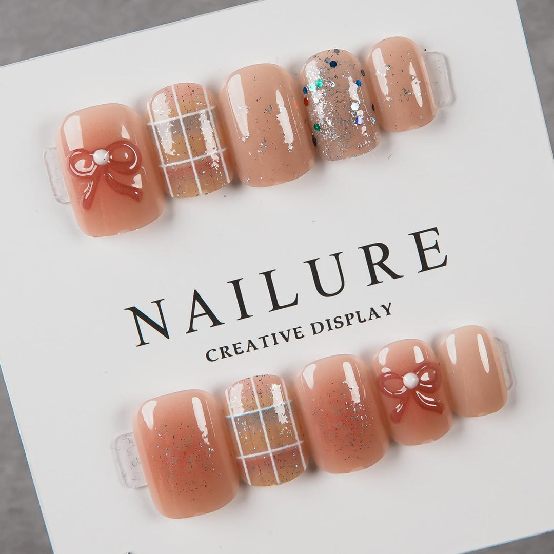 Artistic Press-On Nail Set with Decorative Bow Accents