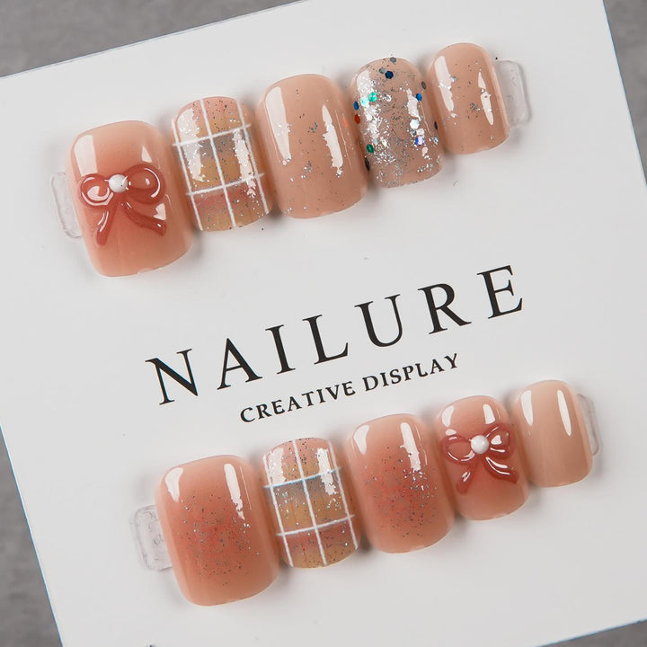 Artistic Press-On Nail Set with Decorative Bow Accents