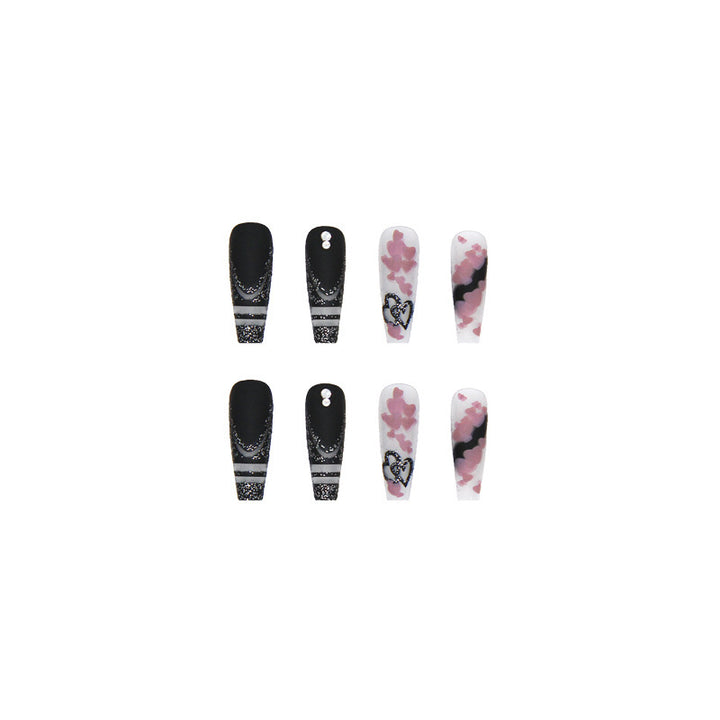 Artificial nail set with creative 3D elements and sparkling accents Stornfield