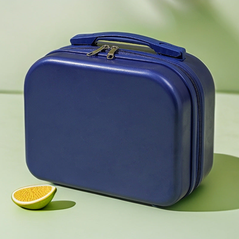 hard-shell travel vanity case with molded handle and double-zip closure Stornfield