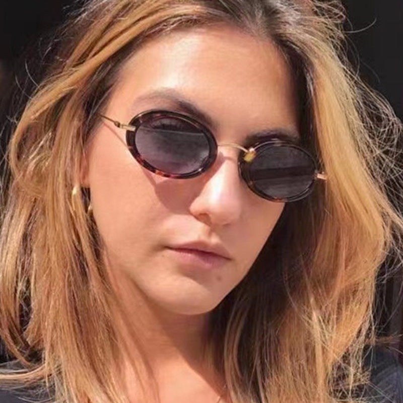 Ladies fashionable sunglasses in elegant oval design Stornfield