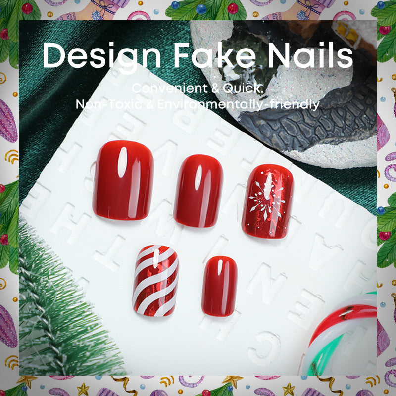 Artificial nail set with festive designs and glitter accents Stornfield