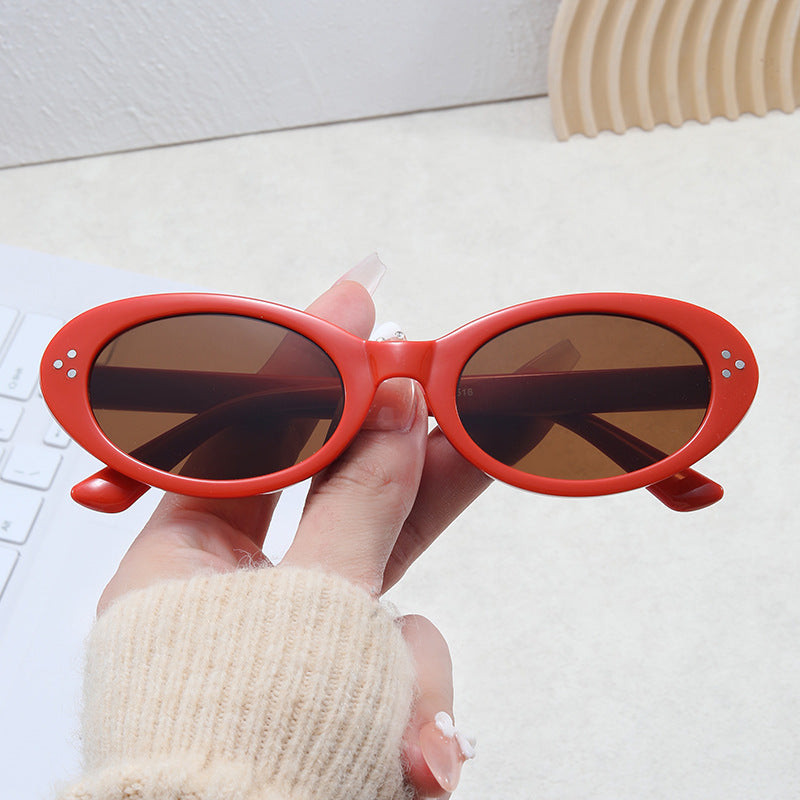 Ladies fashionable sunglasses in elegant oval design Stornfield