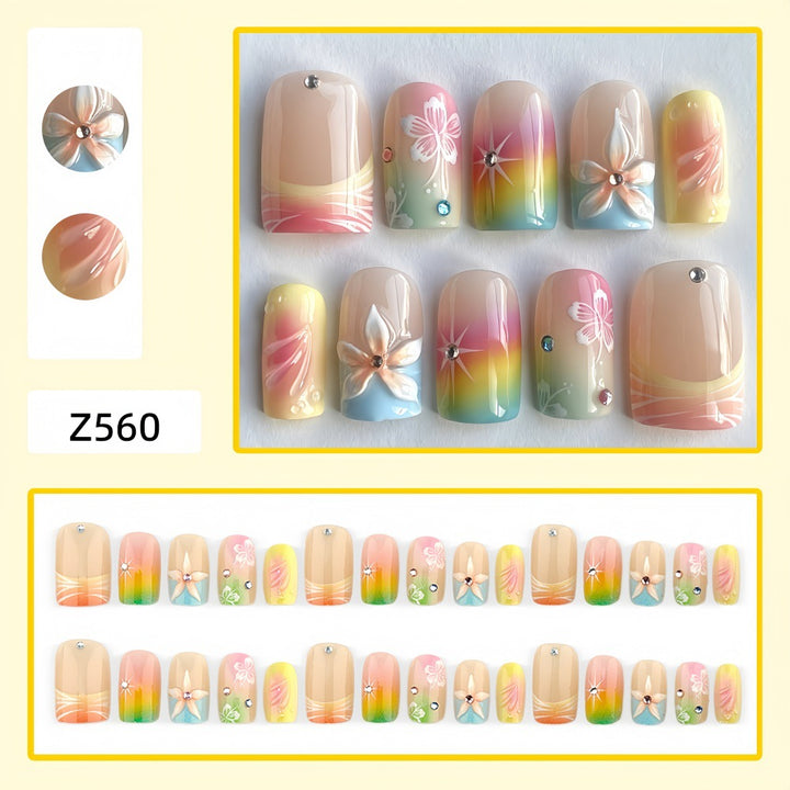 Acrylic nails with floral accents and gradient Stornfield