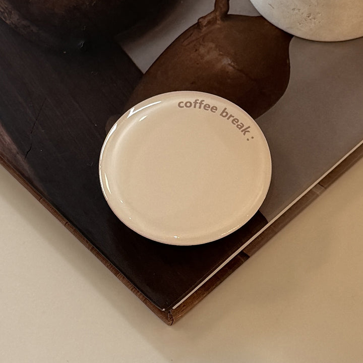Decorative ceramic coaster with the inscription Stornfield