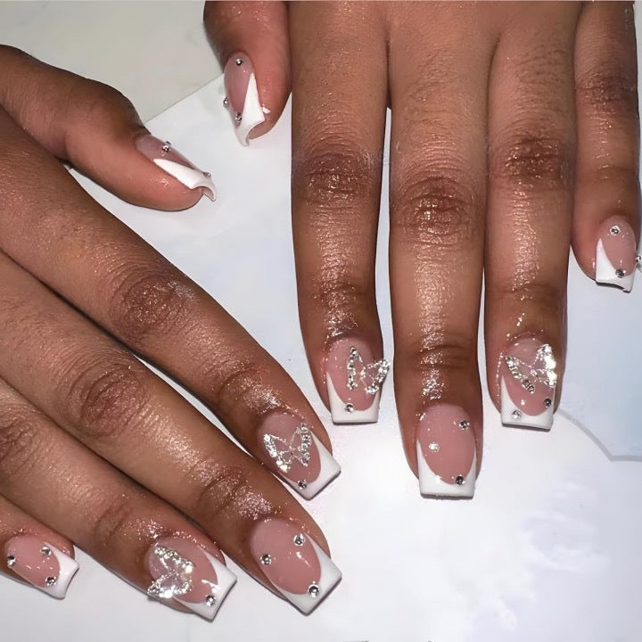 Artificial nails with elegant butterfly embellishments Stornfield