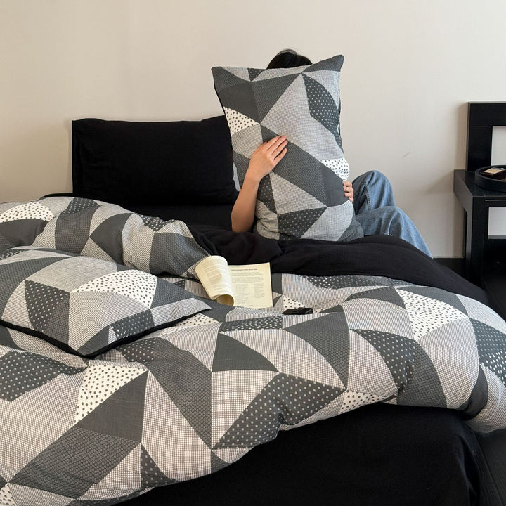 Patchwork bedding set with animal and check pattern design