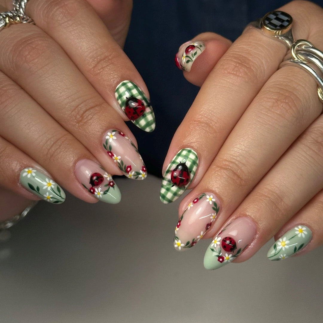 Artistic Press-On Nail Art Set with Floral Ladybug Design Stornfield