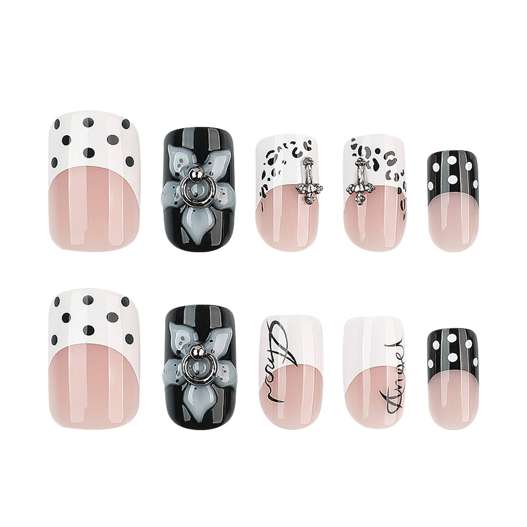 Artful nail extensions with elegant black-and-white design Stornfield