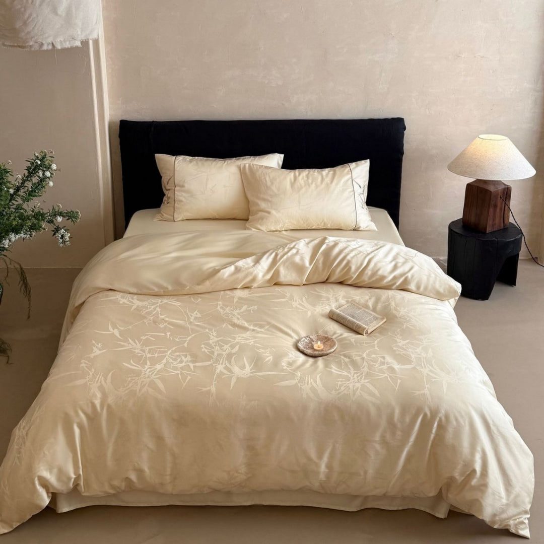 Premium Satin bedding set with subtle jacquard leaf pattern and silky finish