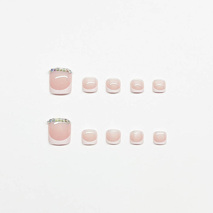 Nail art set with elegant French design and sparkling accents Stornfield