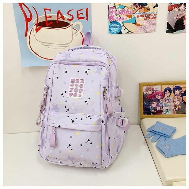 Playful backpack with star motifs and practical functions Stornfield