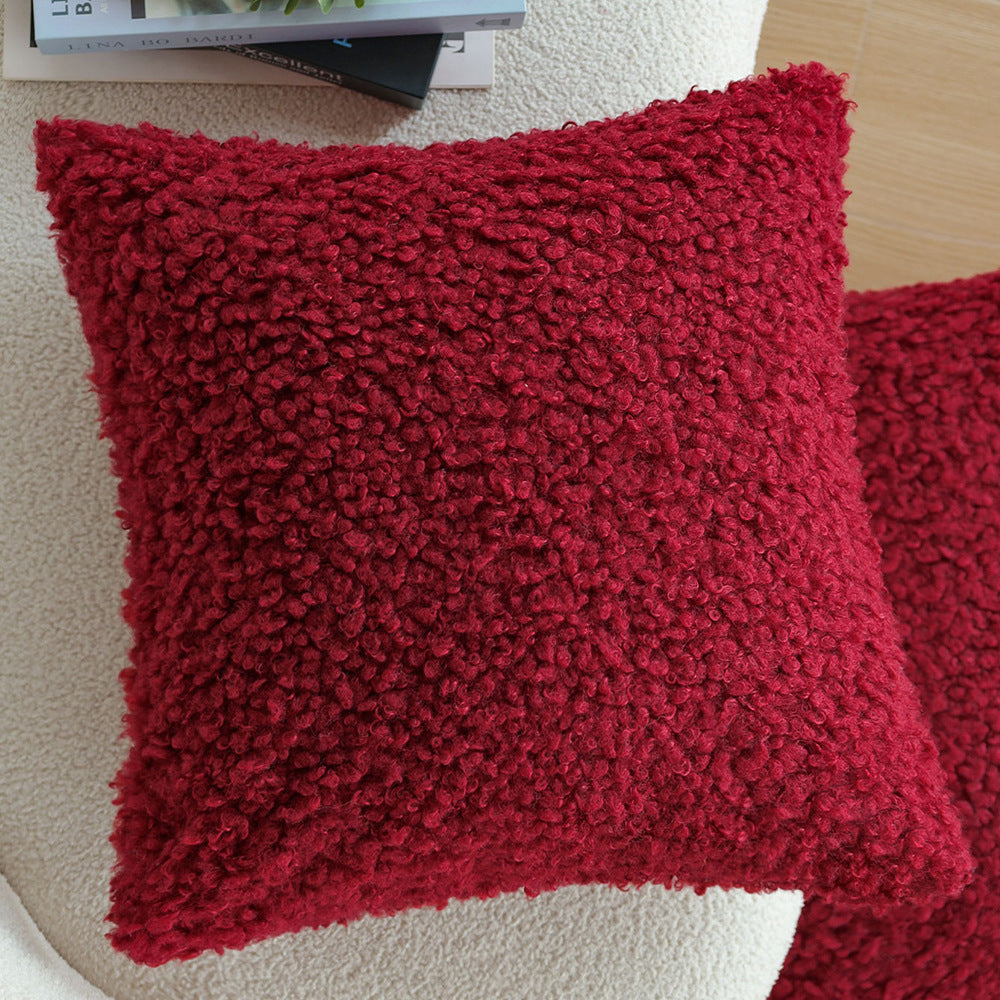 Rectangular decorative cushion with bouclé relief and tassels Stornfield