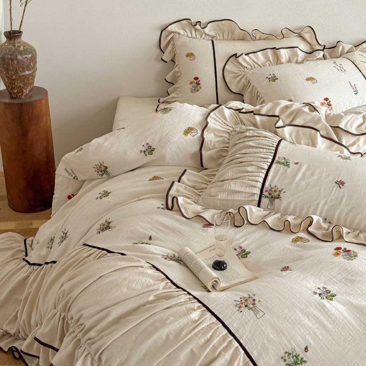 High-quality bed linen set made of linen-cotton blend with wildflower embroidery and ruffled hem