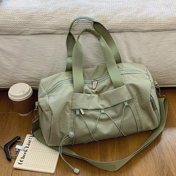 Sporty shoulder bag with adjustable carrying handles and breathable mesh material Stornfield