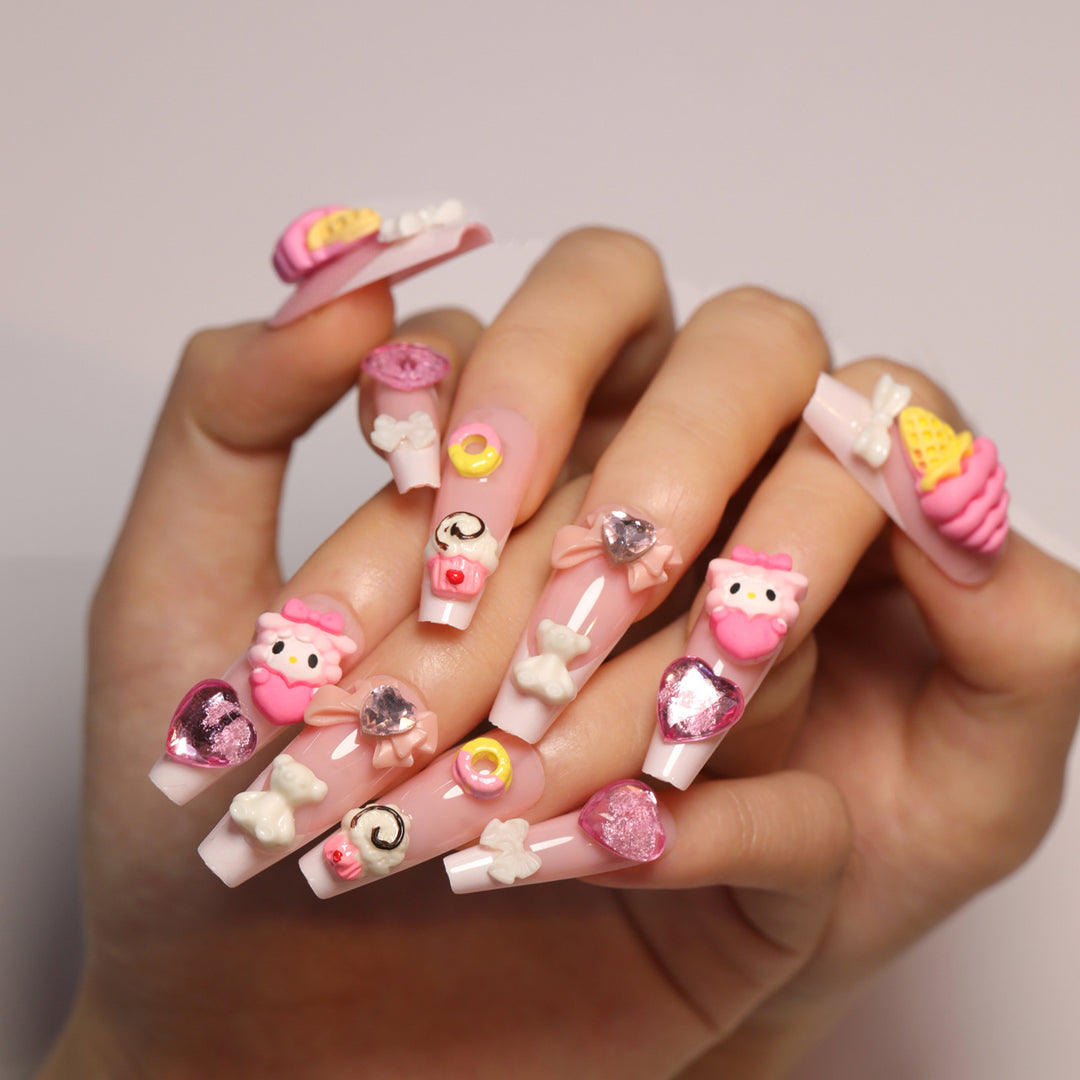 Artful nail extensions with 3D dessert motif Stornfield