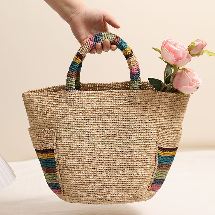 Handcrafted basket bag with colorful stripe accents Stornfield
