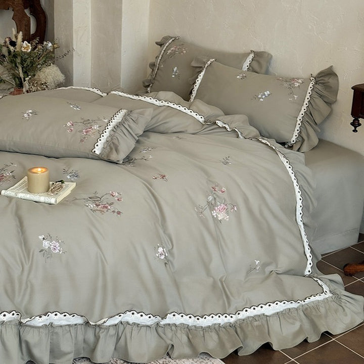 Bedding set made of cotton satin in vintage style with floral embroidery, ruffle and lace trim