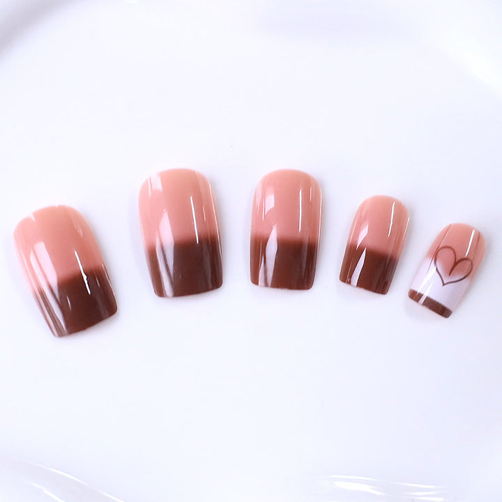 Artistic Heart-Embellished Nail Design Stornfield