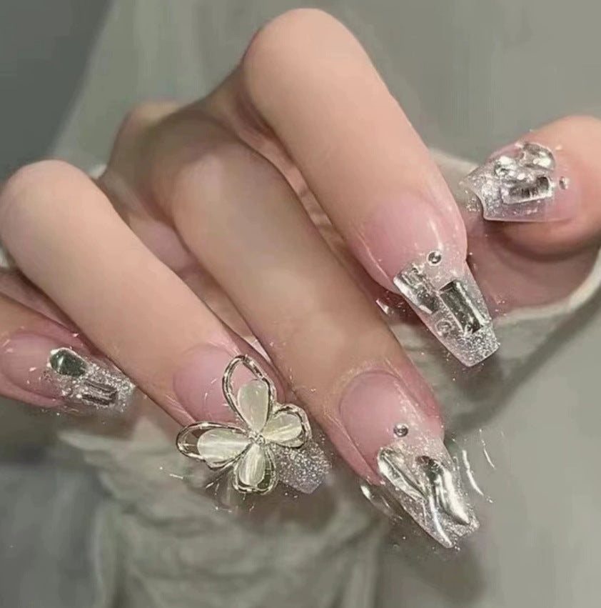Elegant nail design with pearl embellishment Stornfield