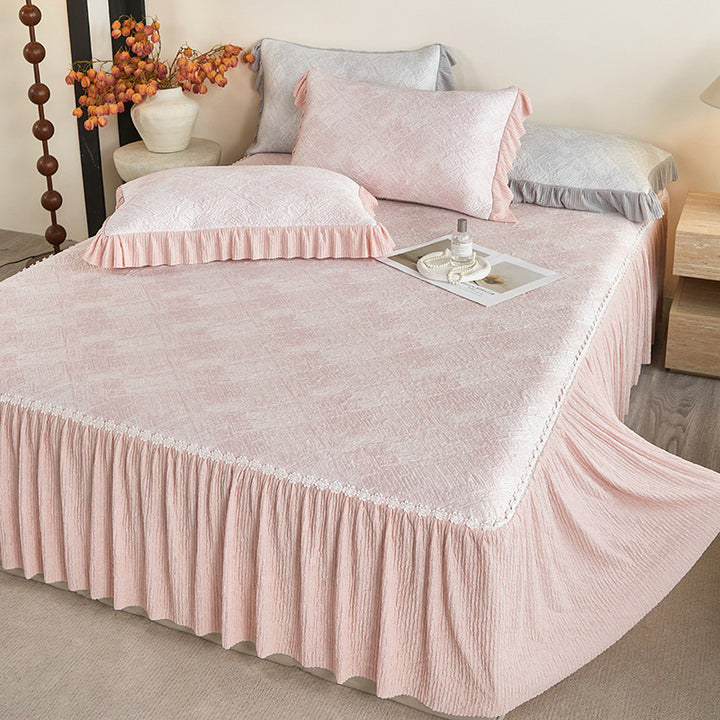 Reversible mattress protector with pleated ruffle and microfiber velvet surface