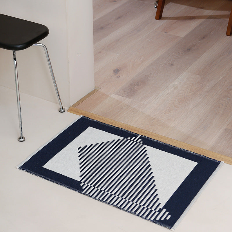 Modern geometric bathroom rug made of flat-woven cotton with non-slip backing Stornfield