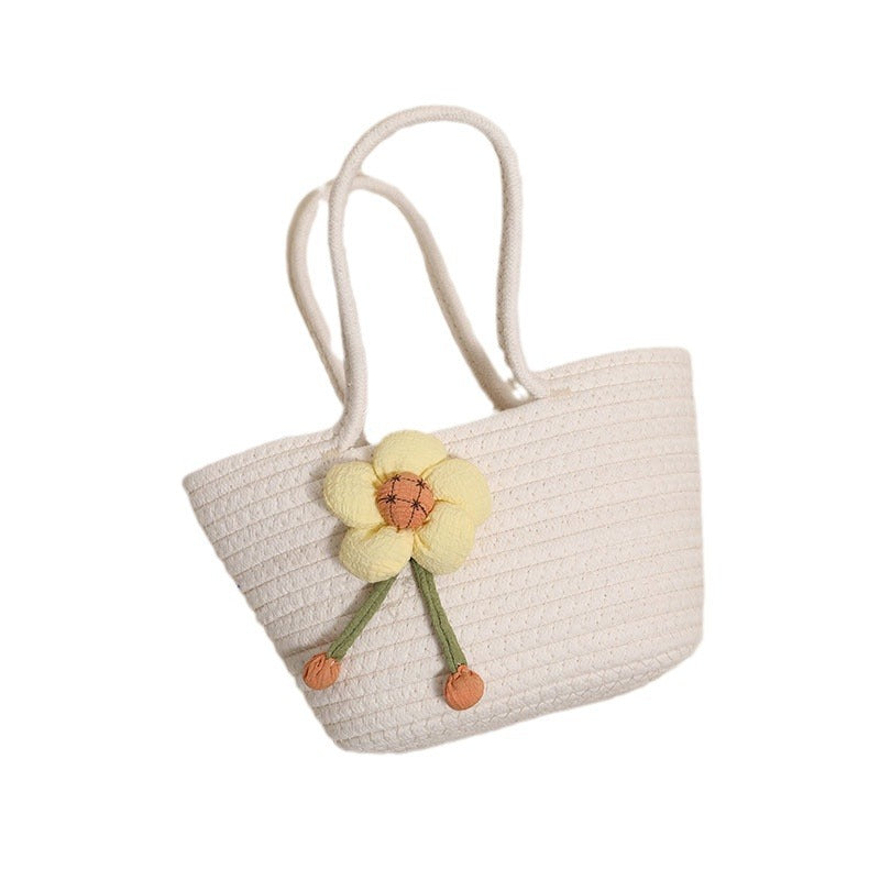 Handcrafted basket bag with floral accents Stornfield