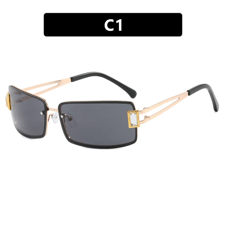 Ladies stylish sunglasses with elegant trapezoidal lenses and filigree metal frame Stornfield