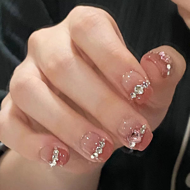 Glamorous nail art with rhinestone details Stornfield