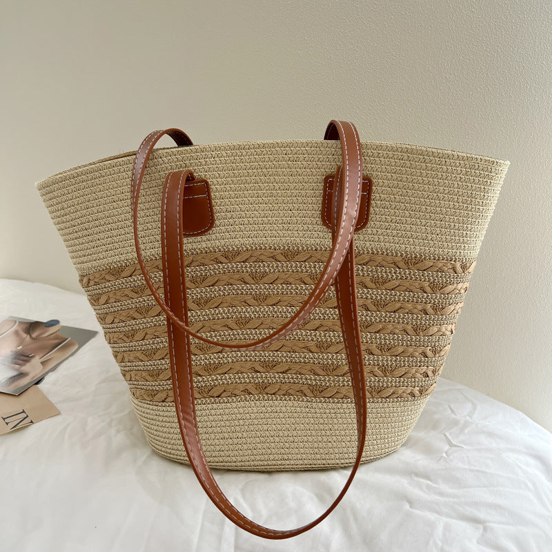 Handcrafted wicker bag with elegant leather accents Stornfield