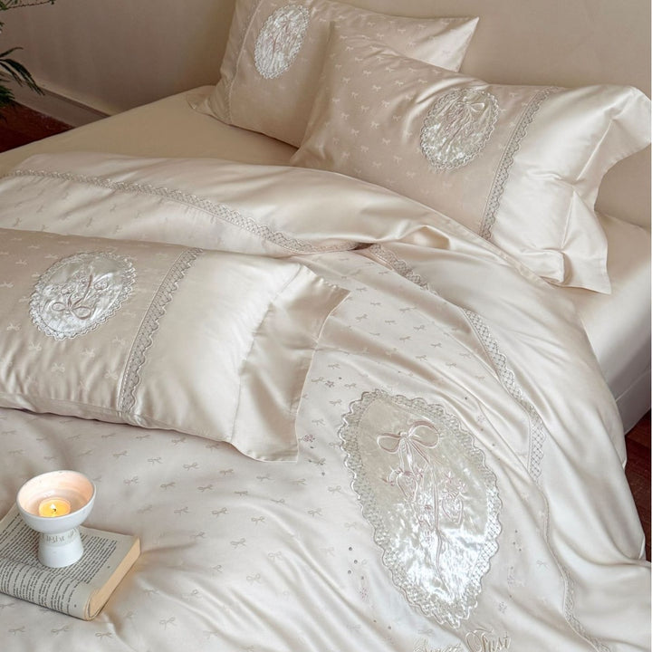 Luxurious cotton satin bedding set with embroidered medallion appliqués and lace trim